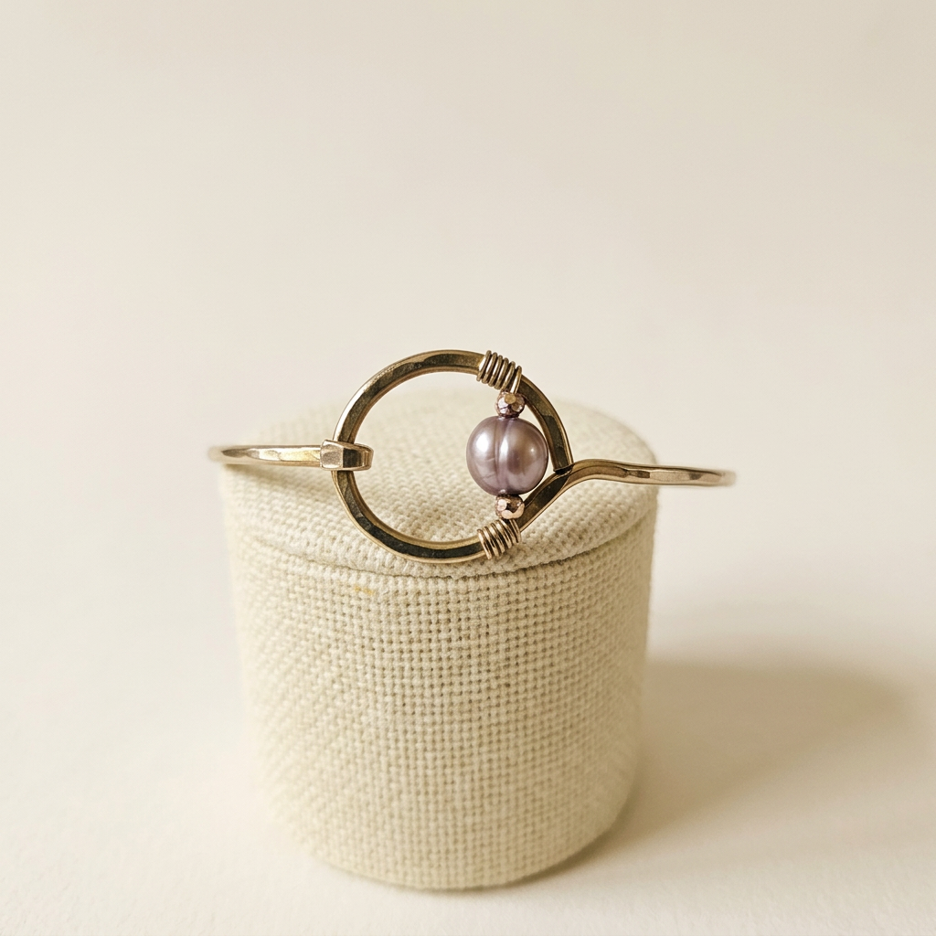 Studio edit of gray pearl bracelet