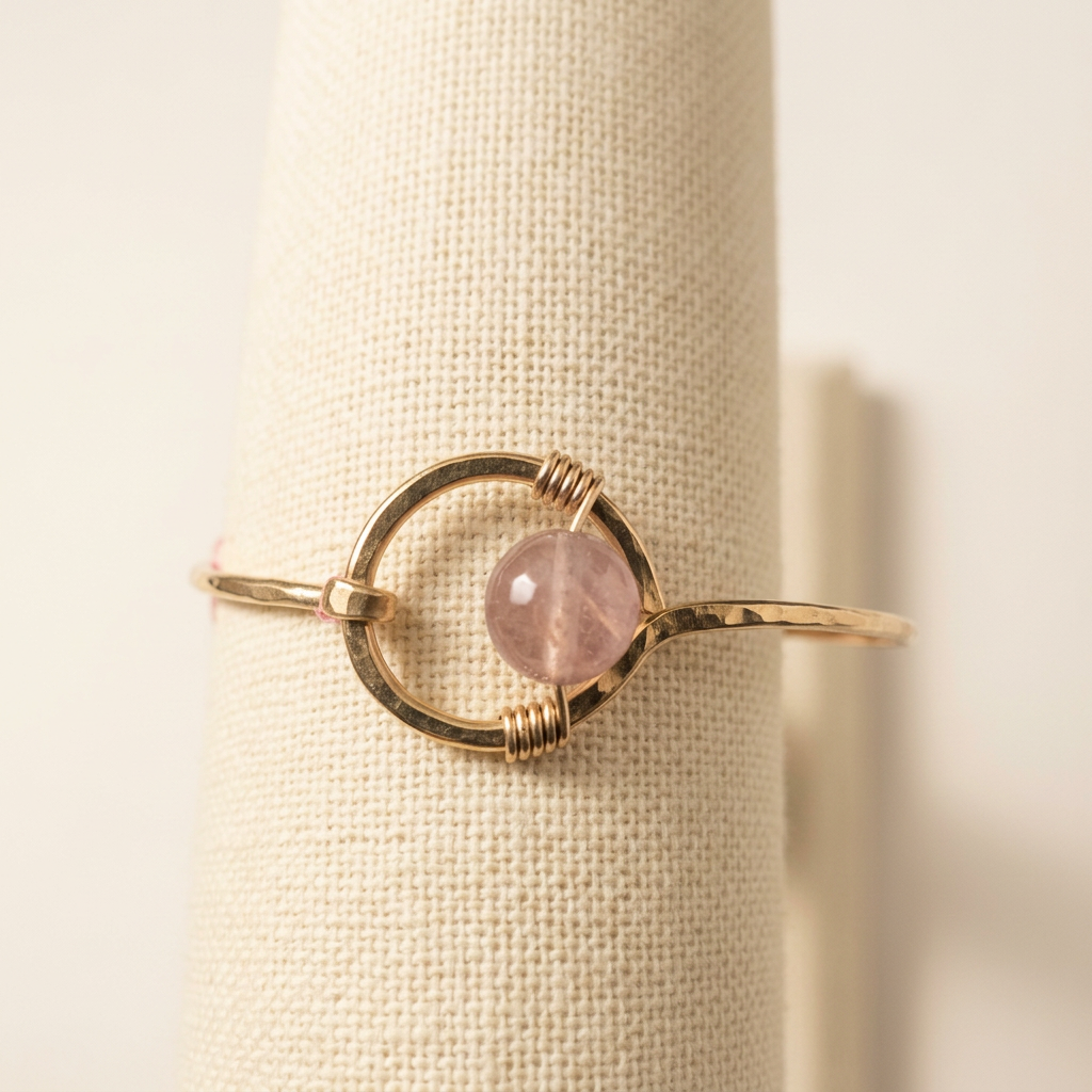 Studio edit of pale pink bracelet alternate angle