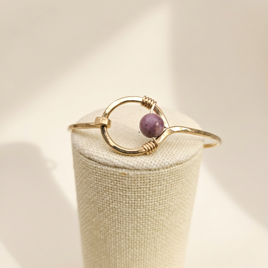 Studio edit of purple bracelet alternate angle