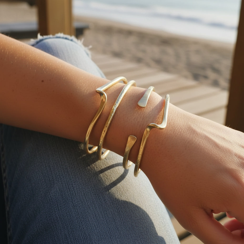 gorgeous handmade brass bracelets on a womans arm